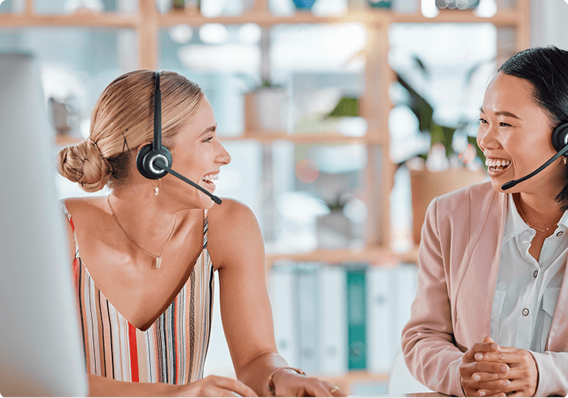 Two business professionals with headsets: what is business broadband